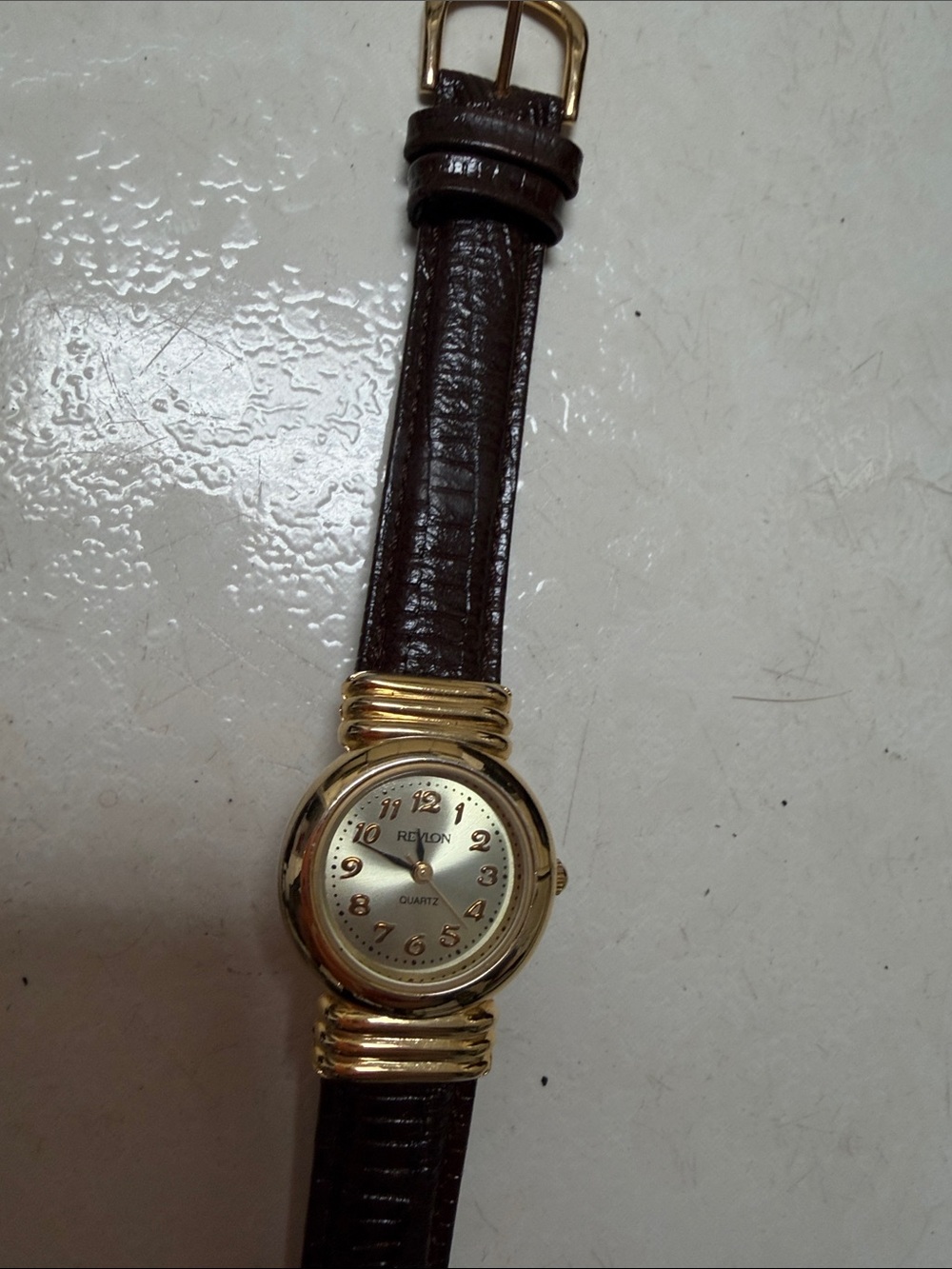 Revlon Gold-Tone Round Watch with Dark Brown Strap